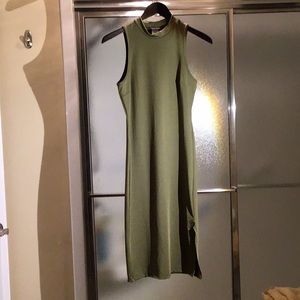 Below knee olive shift dress with high neck, slit